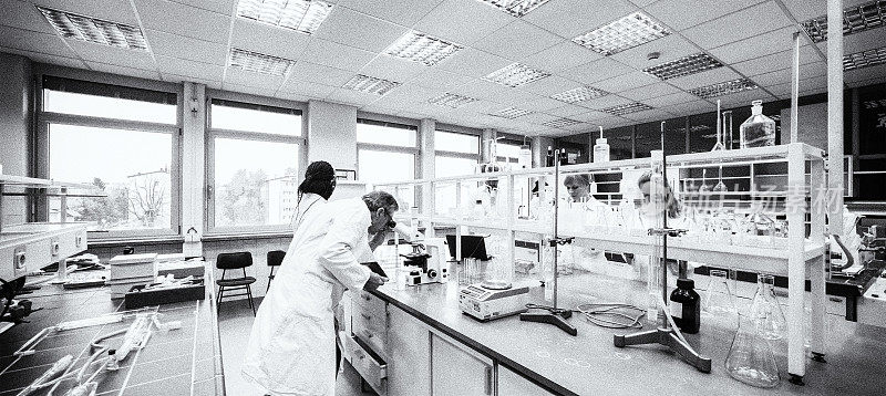 Group of scientists working in laboratory